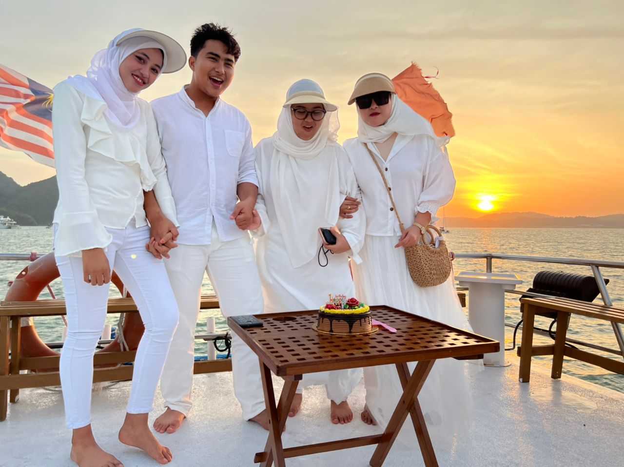 Guests celebrating birthday on Langkawi halal sunset cruise